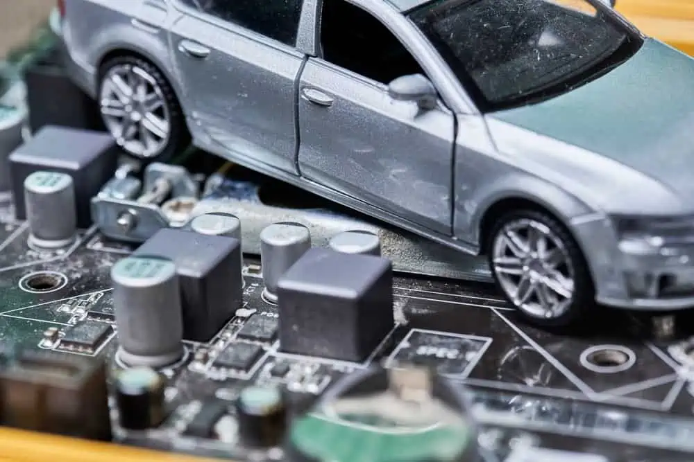 Cpu,Chip,And,Semiconductors,With,Car,Toy.,Global,Car,Chip Experts predict the PCB supply chain shortage of parts will continue into 2024